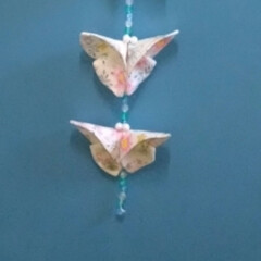 「以前に作った折り紙のお花に余り布で蝶２匹…」(2枚目)